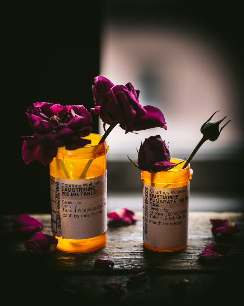 Bipolar II medication bottles with flowers