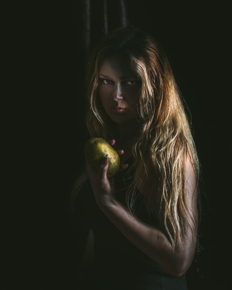 Courtney Whitman holding a potato