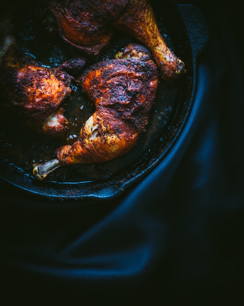 Persian-spiced chicken thighs in cast iron skillet