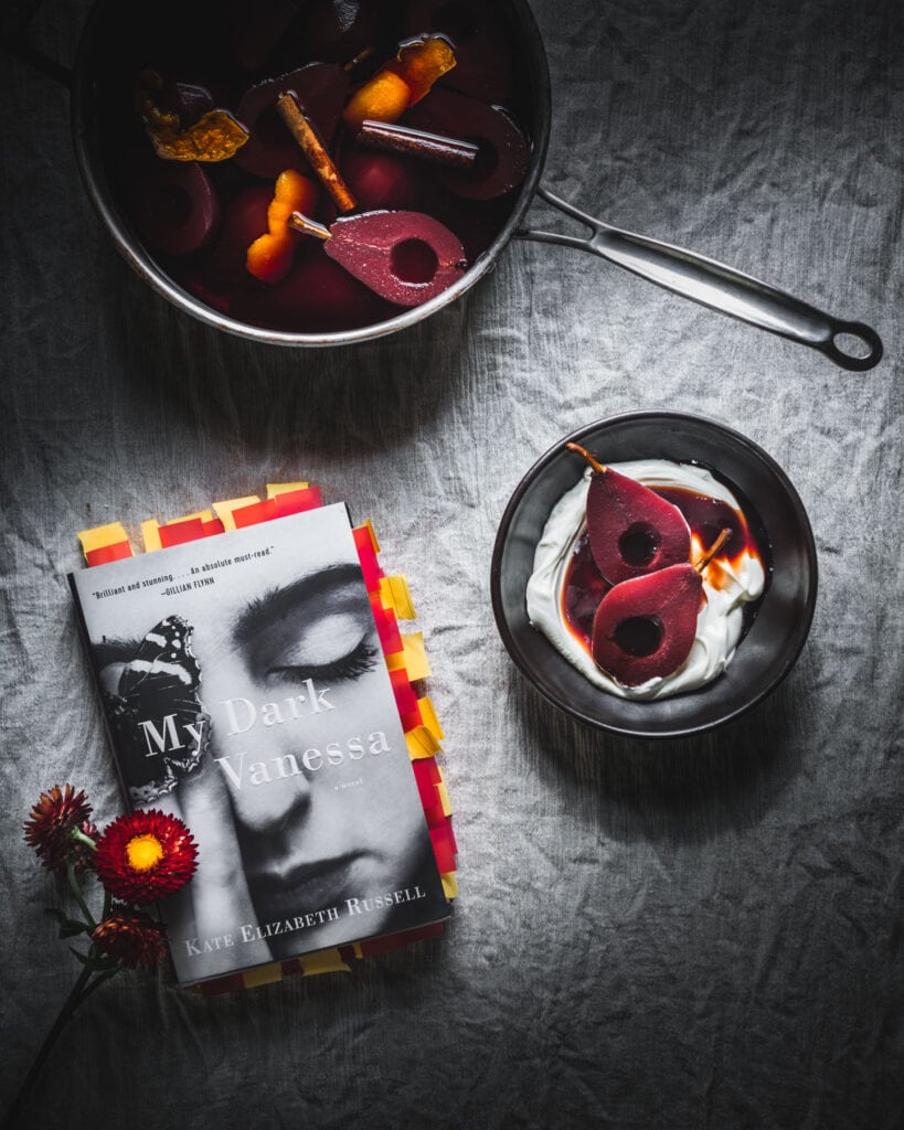 Mulled wine poached pears with greek yogurt and My Dark Vanessa book